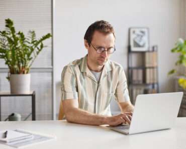 Freelancer Man Working On Laptop
