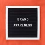 Brand awareness on orange background