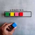 Top view image of loading bar with colorful wooden blocks on concrete floor.